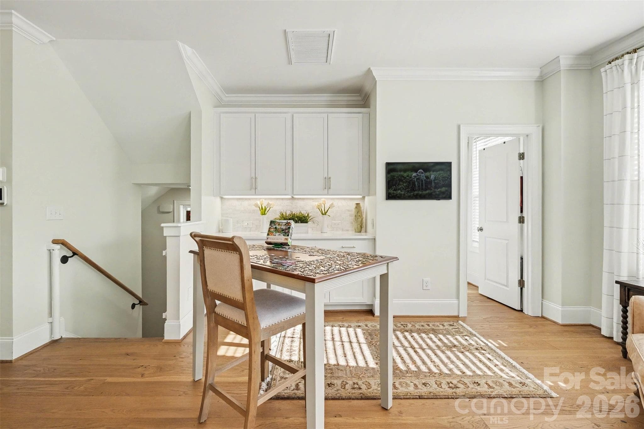 Extra space in the kitchen area... for a puzzle table, reading, relaxing. A nice space to make your own! (And the framed TV stays)! - 3743 Keyworth Way, Indian Land