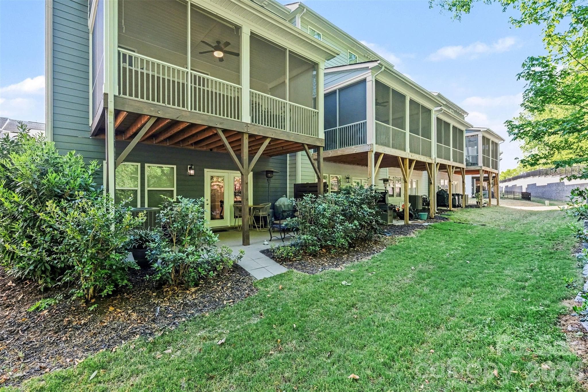 Main level porch with access to the back yard. Enough to enjoy without a lot of maintenance! - 3743 Keyworth Way, Indian Land