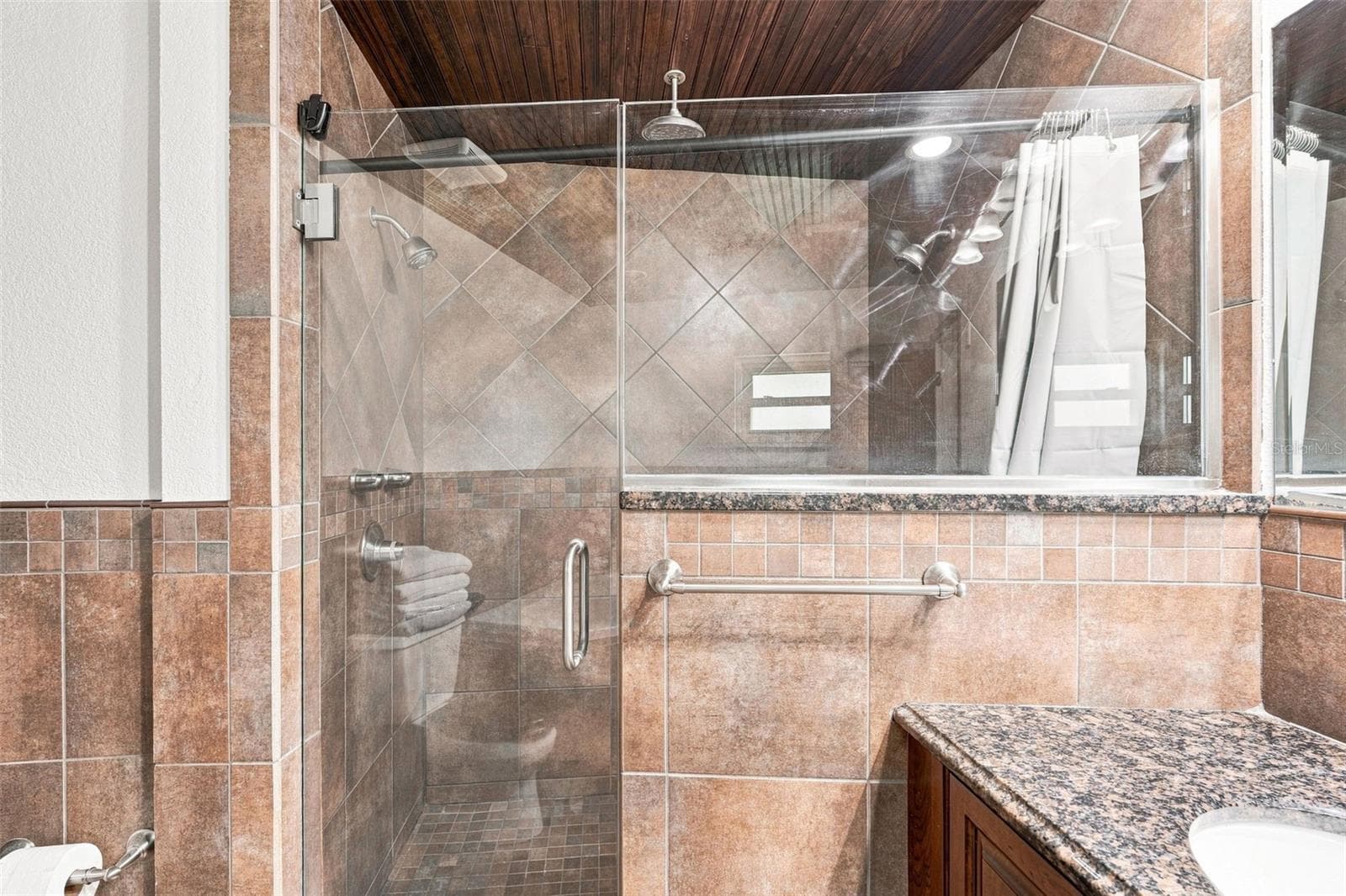 Spa-like Walk-in Shower with Framless Glass Enclosure - 155 MORGAN LN SE, PORT CHARLOTTE