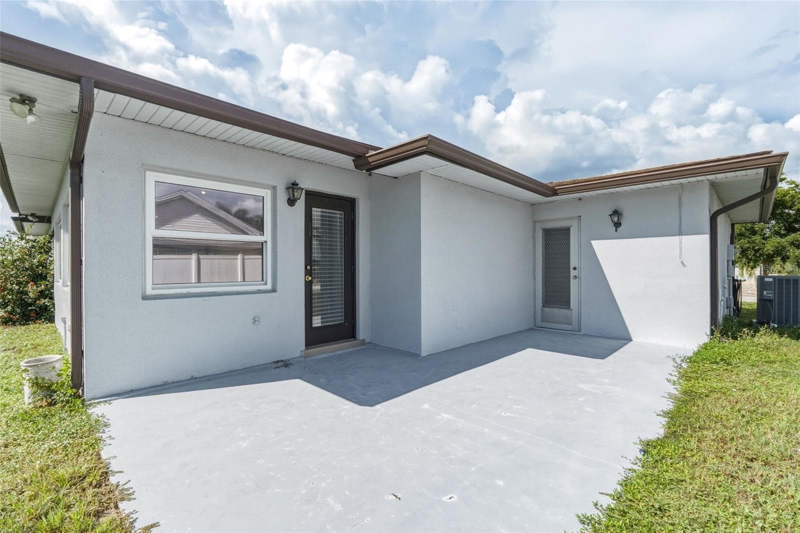Rear Patio with Plenty of Room for Outdoor Entertaining - 155 MORGAN LN SE, PORT CHARLOTTE