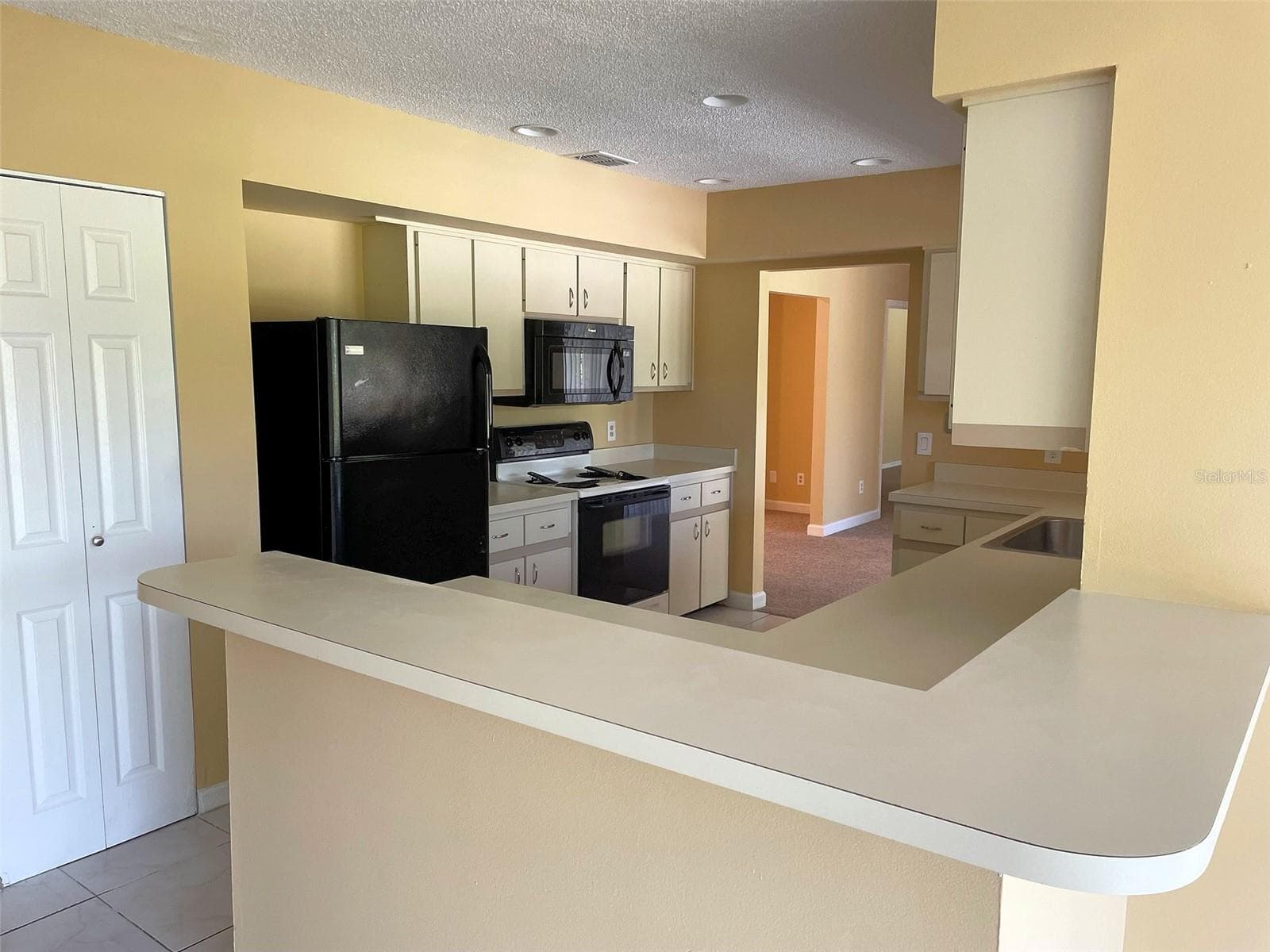 Kitchen with pantry storage - 4431 REAL CT, ORLANDO