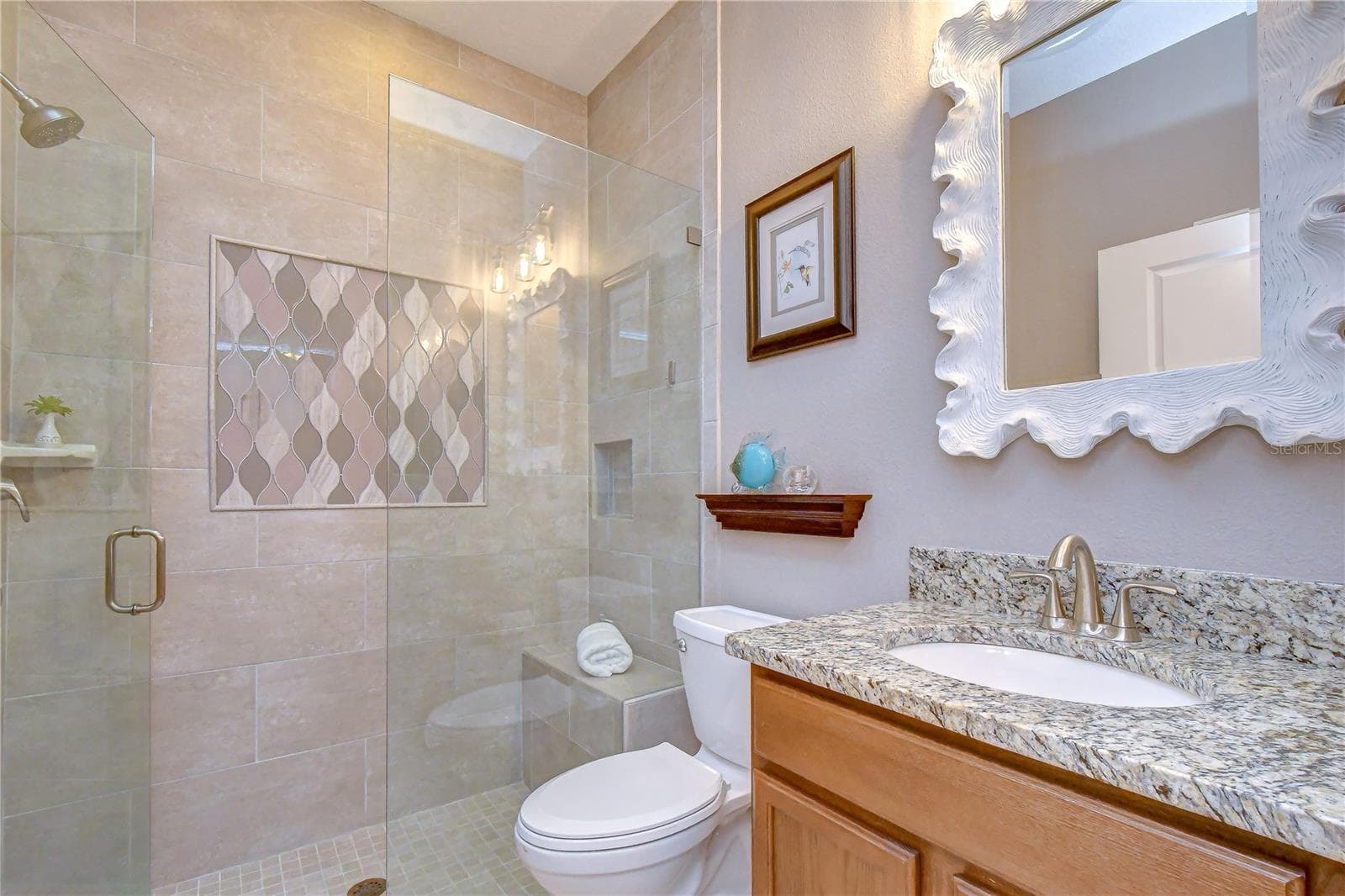 Bath 2 has a walk in shower - 6810 MUNCASTER CT, TAMPA