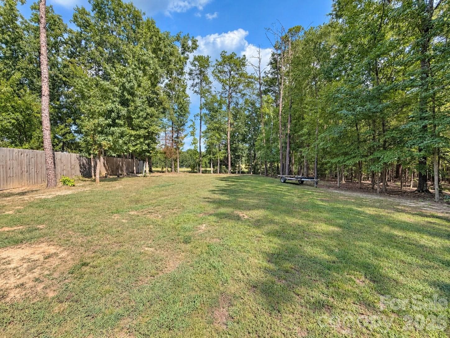 Furthest part of the back yard that backs up to a farm with farm animals - 9201 Providence Road S, Waxhaw