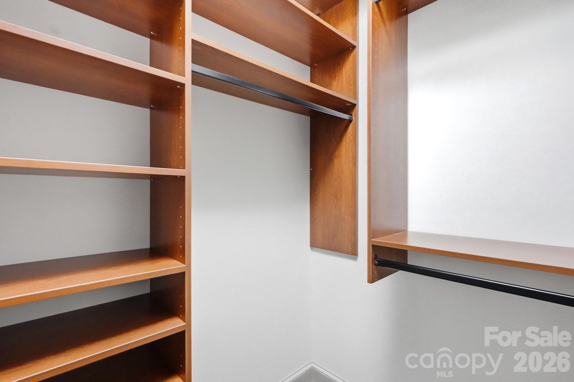 One of two primary walk in closet - 7130 Prescott Pond Lane, Charlotte