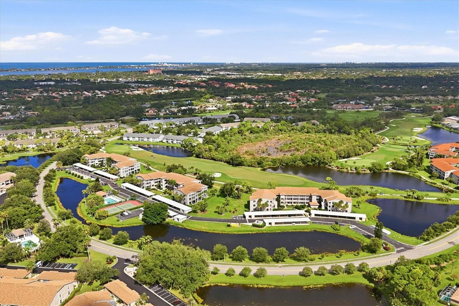 Club South has its own heated pool, tennis/pickleball and grill areas - 9610 CLUB SOUTH CIR #4107, SARASOTA