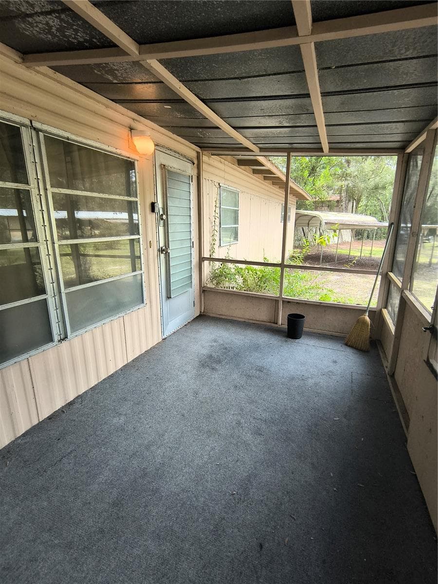 Large covered porch - 18250 CAUFIELD RD, SPRING HILL