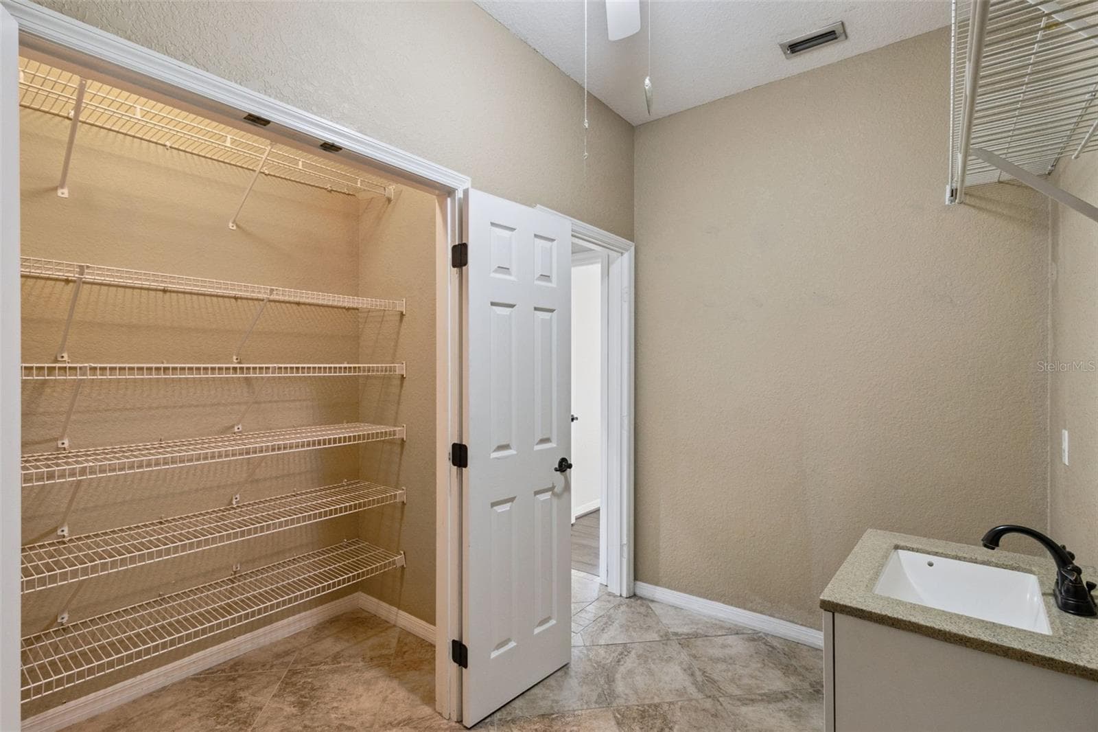 Oversized Storage Space in Laundry Room - 5937 TROPHY LOOP, LAKELAND