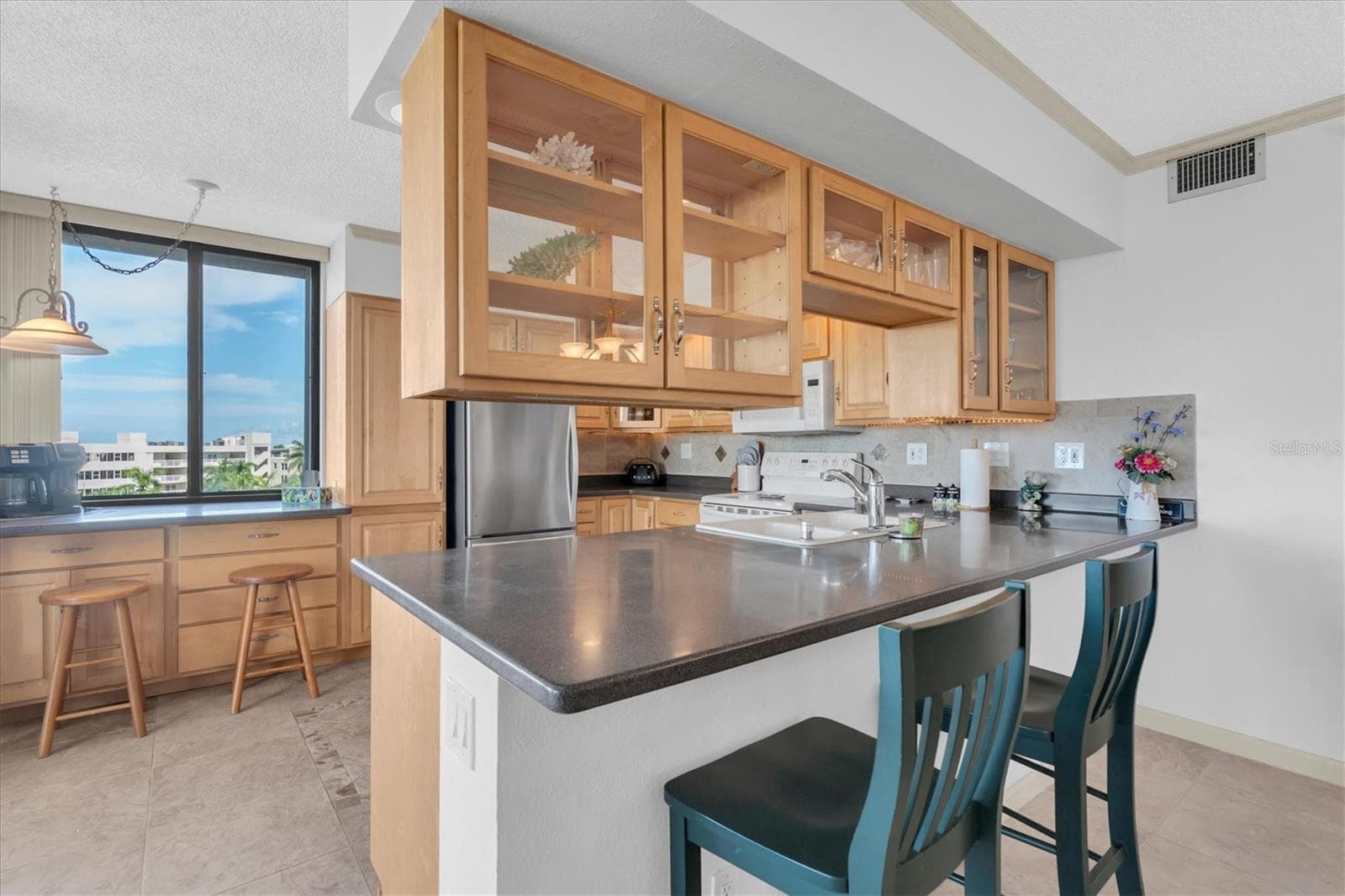 bar with custom cabinets - 6287 BAHIA DEL MAR CIR #602, ST PETERSBURG