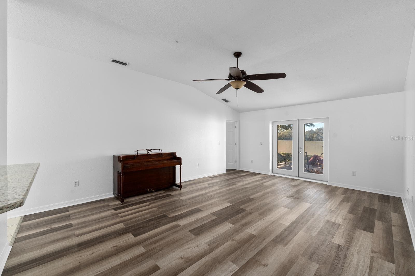 Living Room with access to 4th Bedroom - 3609 TRAPNELL GROVE LOOP, PLANT CITY