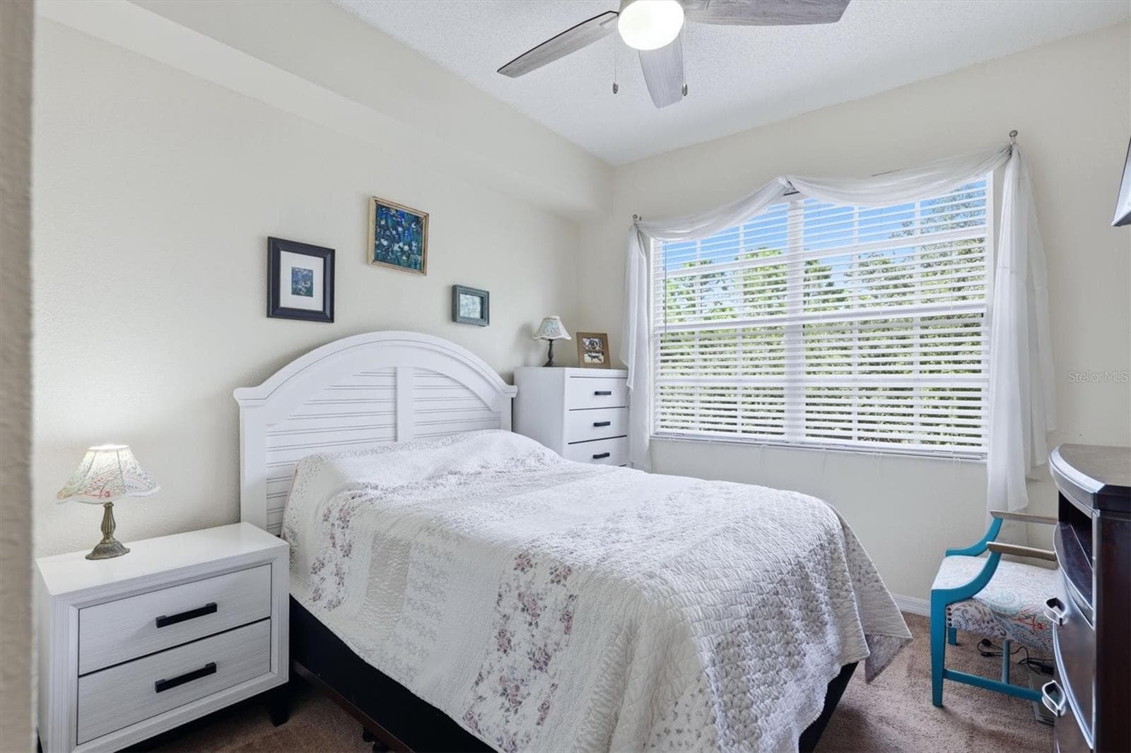 Second bedroom on the main floor - 5001 BARALDI CIR #22-209, SARASOTA