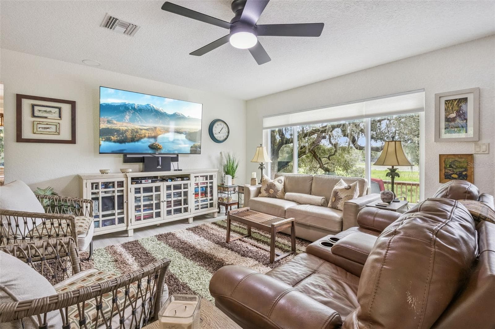 Open and airy living space designed for comfortable everyday living and effortless entertaining. - 1476 SPRING LAKE RD, FRUITLAND PARK