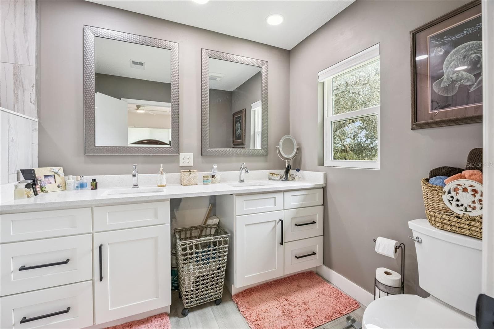 Updated primary bathroom with modern finishes, creating your own personal spa-like retreat. - 1476 SPRING LAKE RD, FRUITLAND PARK