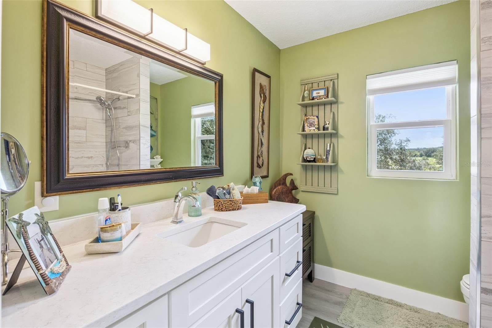 Thoughtful details and natural light fill every room of this lovingly maintained home. - 1476 SPRING LAKE RD, FRUITLAND PARK