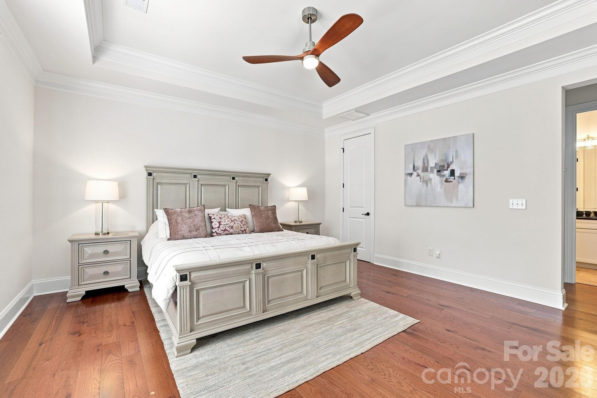 First floor primary bedroom - 6831 Louisburg Square Lane, Charlotte