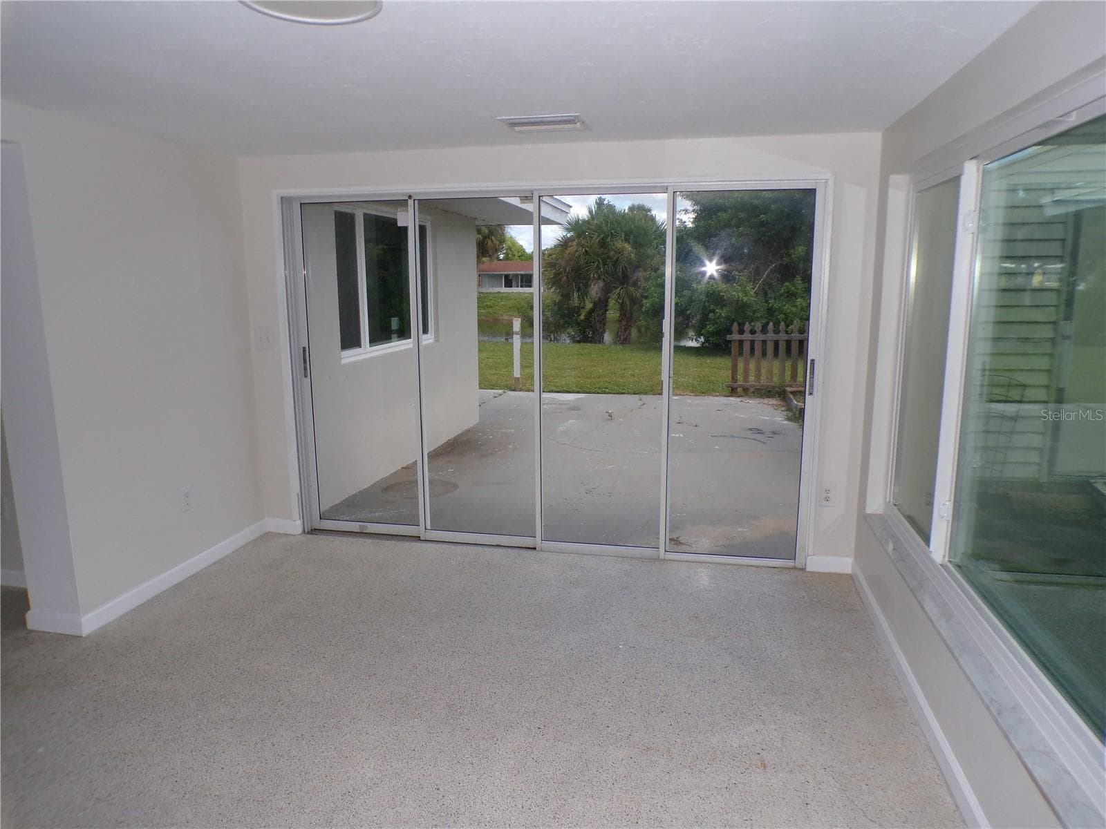 Slider out to patio and back yard - 2185 EASY ST, PORT CHARLOTTE
