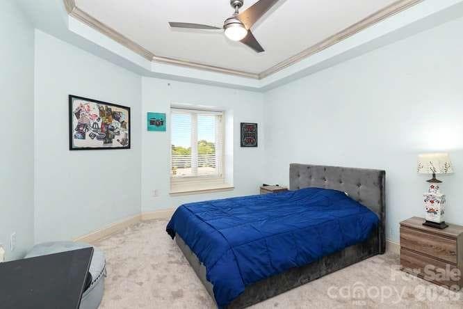 Second bedroom with trey ceiling and ceiling fan - 401 N Church Street, Charlotte