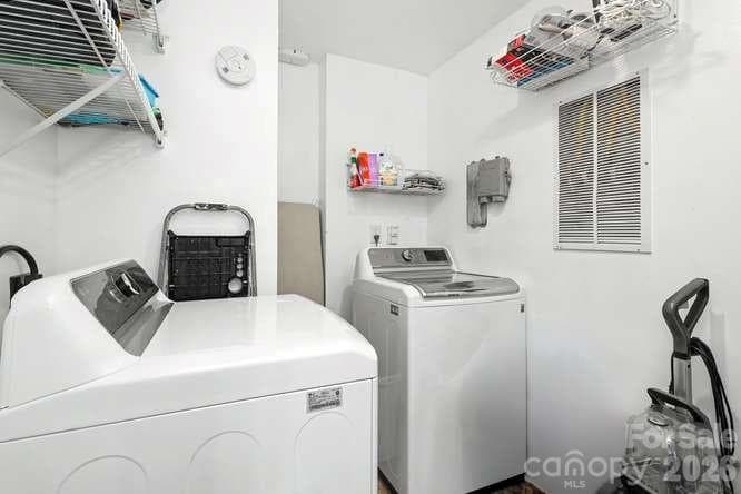 In-unit laundry room has extra storage space. - 401 N Church Street, Charlotte