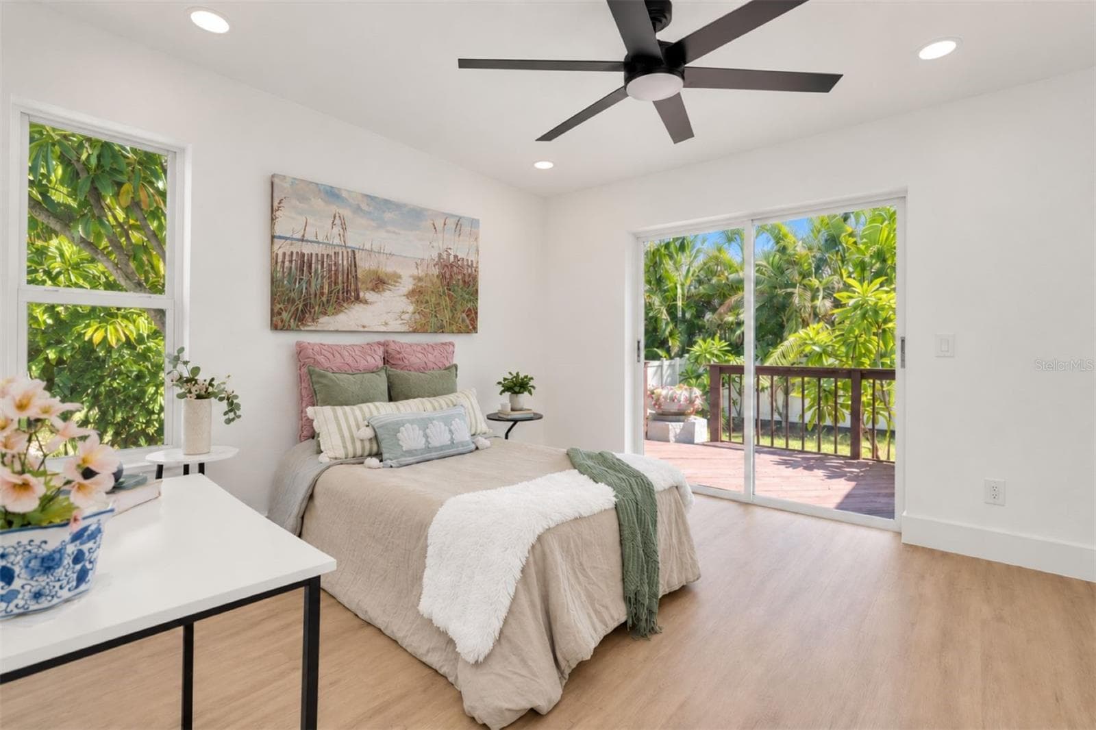 Bedroom 3 with tropical backyard views - 630 PINTA DR, TIERRA VERDE