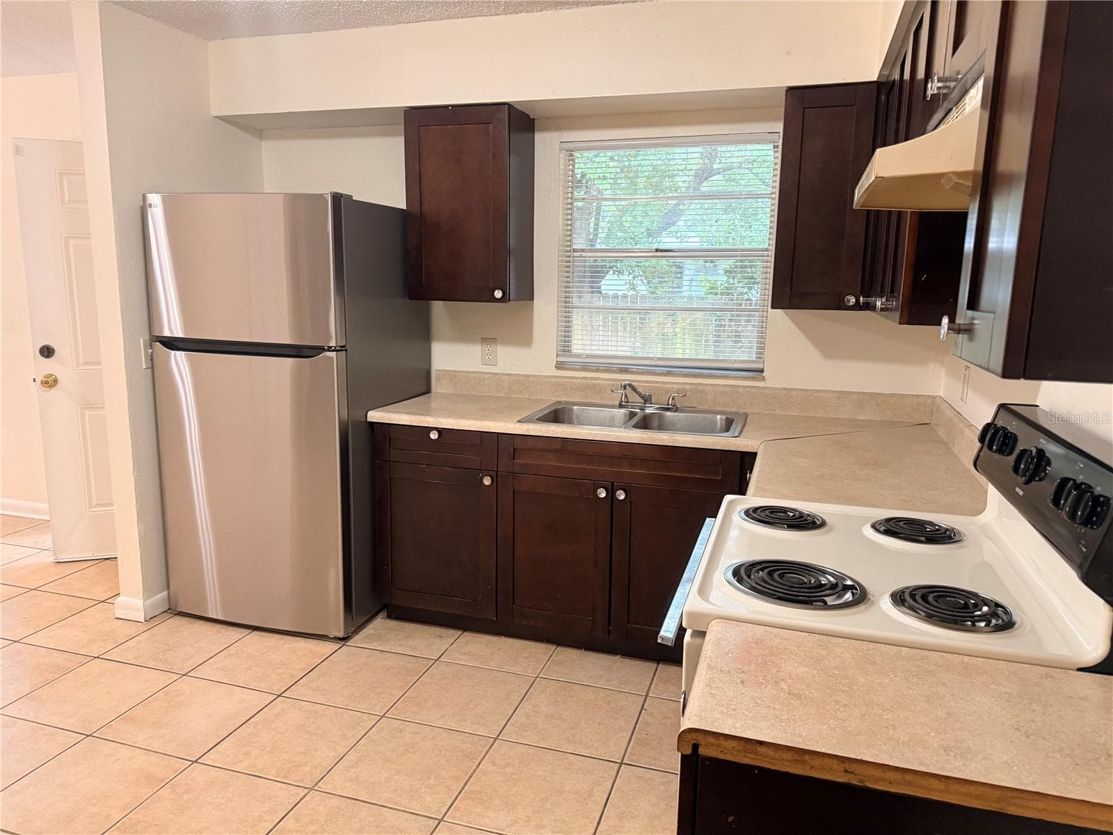 Half Duplex at 9406 N HARTTS DR #A, TAMPA, photo 11 of 24