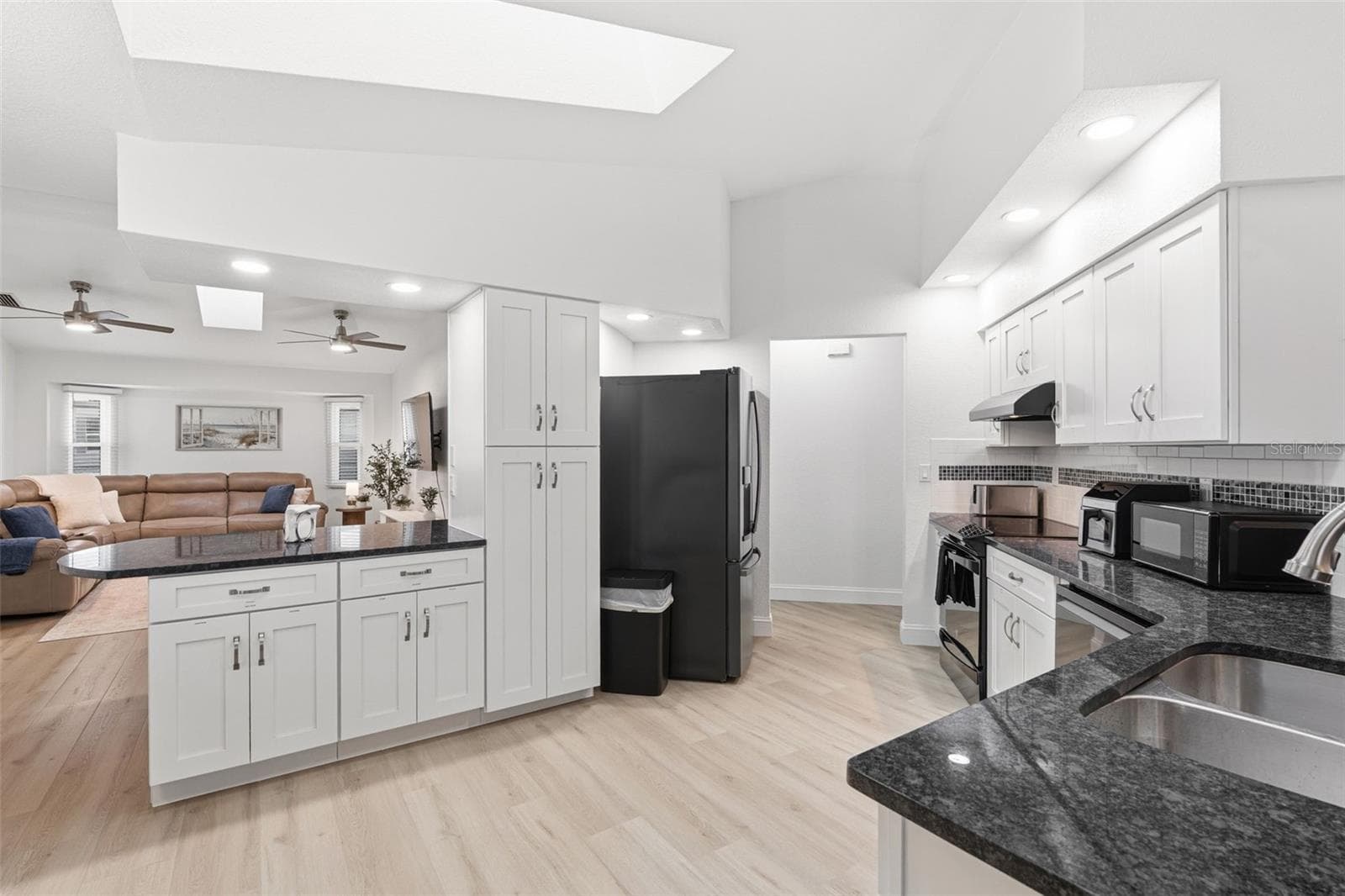 Kitchen with natural lighting from skylights - 4209 FLAMINGO BLVD, PORT CHARLOTTE