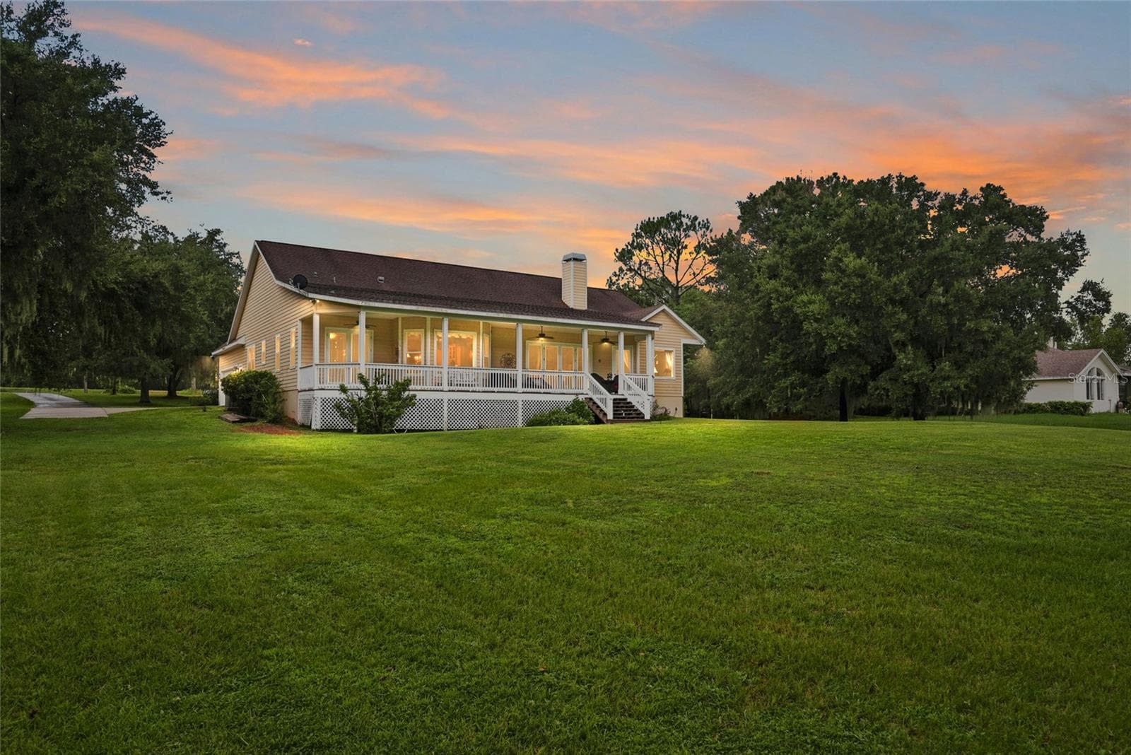 Twilight Image: Back of House - 18350 HANCOCK BLUFF RD, DADE CITY