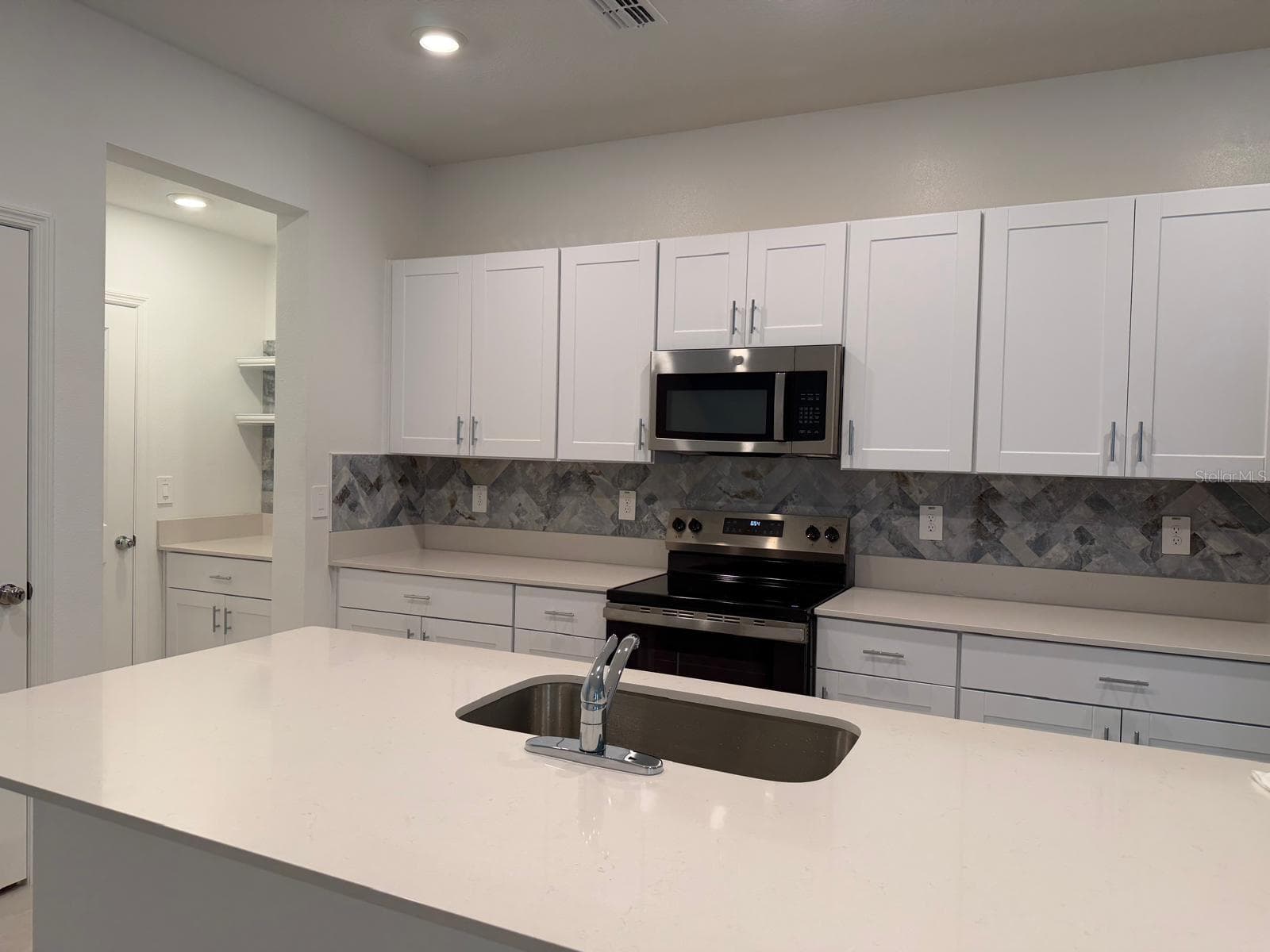 Townhouse at 36206 OBSIDIAN LN, ZEPHYRHILLS, photo 5 of 27
