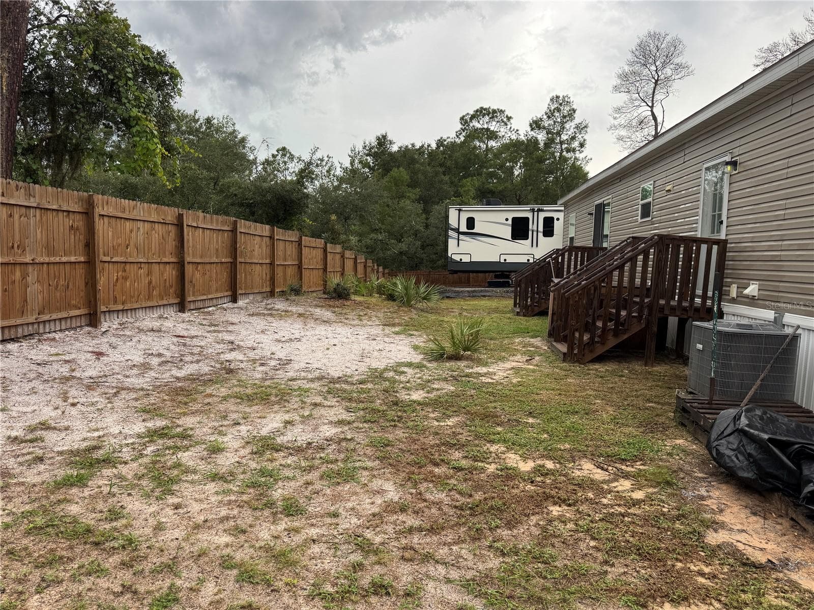 2 separate deck entrances from the rear of the home - 27590 COUNTY ROAD 42, PAISLEY