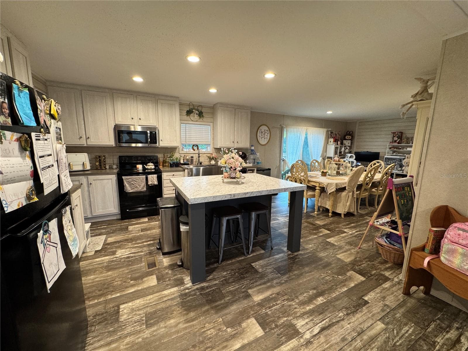 Wonderful kitchen area with center island and overhang countertop - 27590 COUNTY ROAD 42, PAISLEY