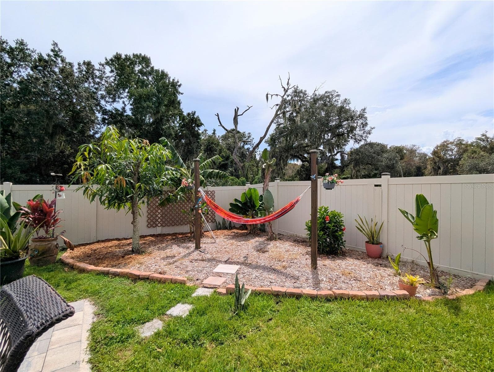 Lay back and enjoy relaxing in a hammock as the sun sets. - 2333 FARNHAM DR, OCOEE