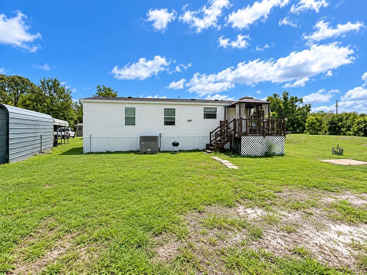 Manufactured Home at 9027 HAMMOCK LOOP, POLK CITY, photo 3 of 7