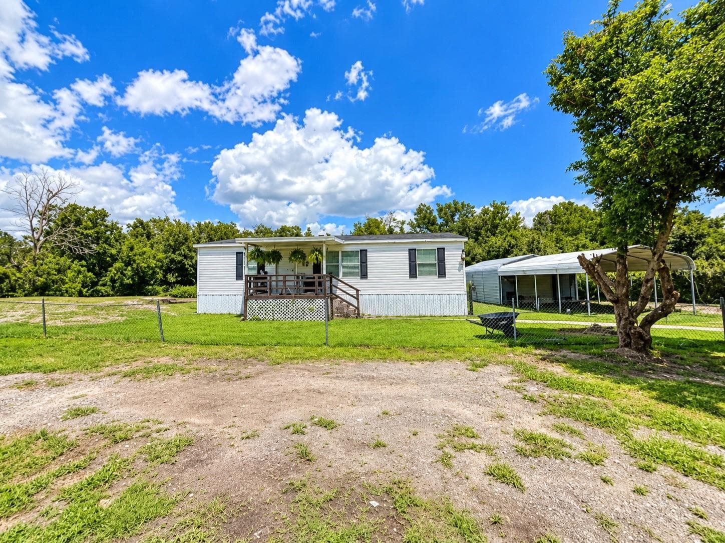 Manufactured Home at 9027 HAMMOCK LOOP, POLK CITY, photo 4 of 7