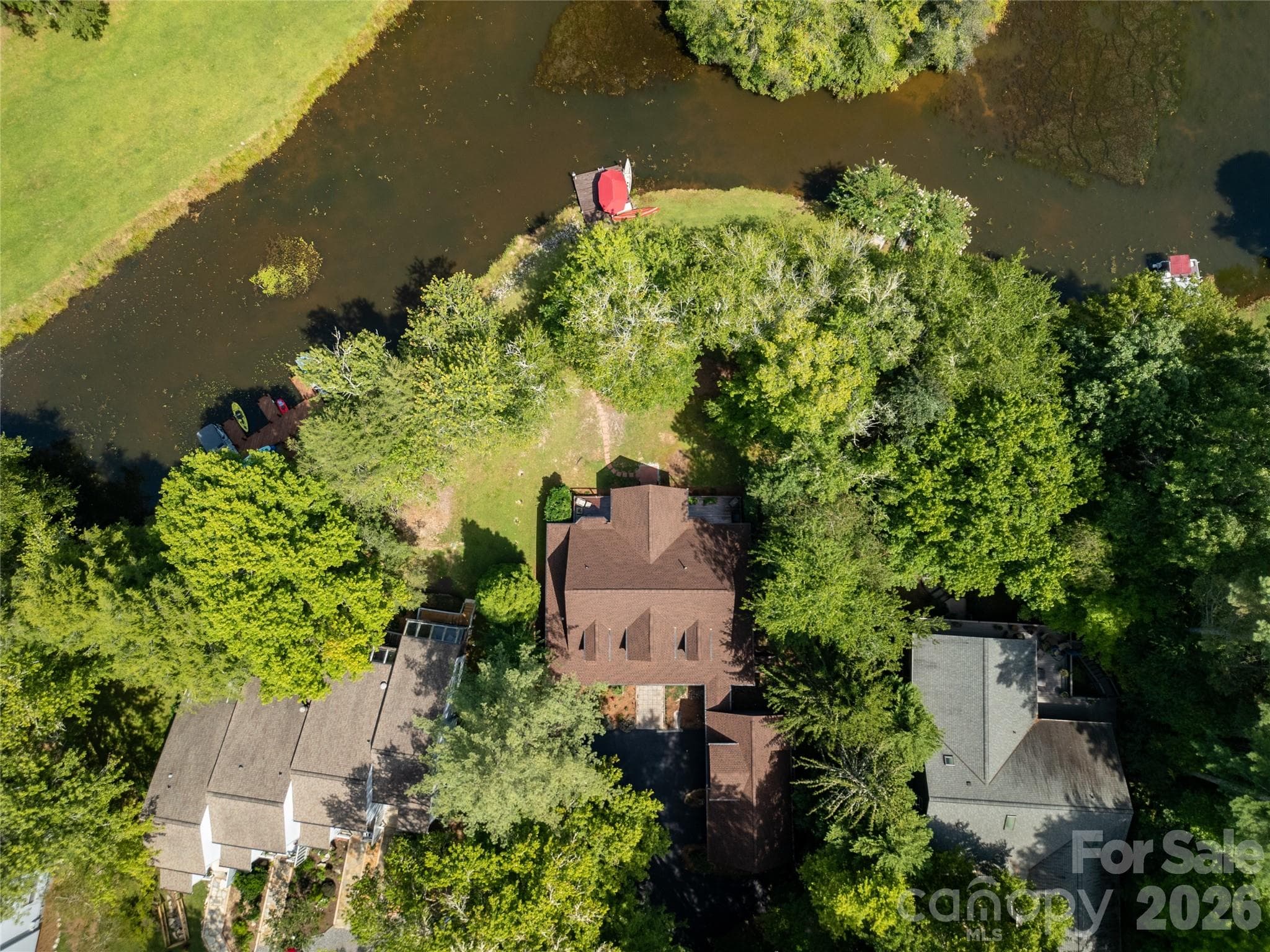 Located on the "Little" portion of Lake Atagahi with a level lot to the lake - 111 Kanunu Court, Brevard