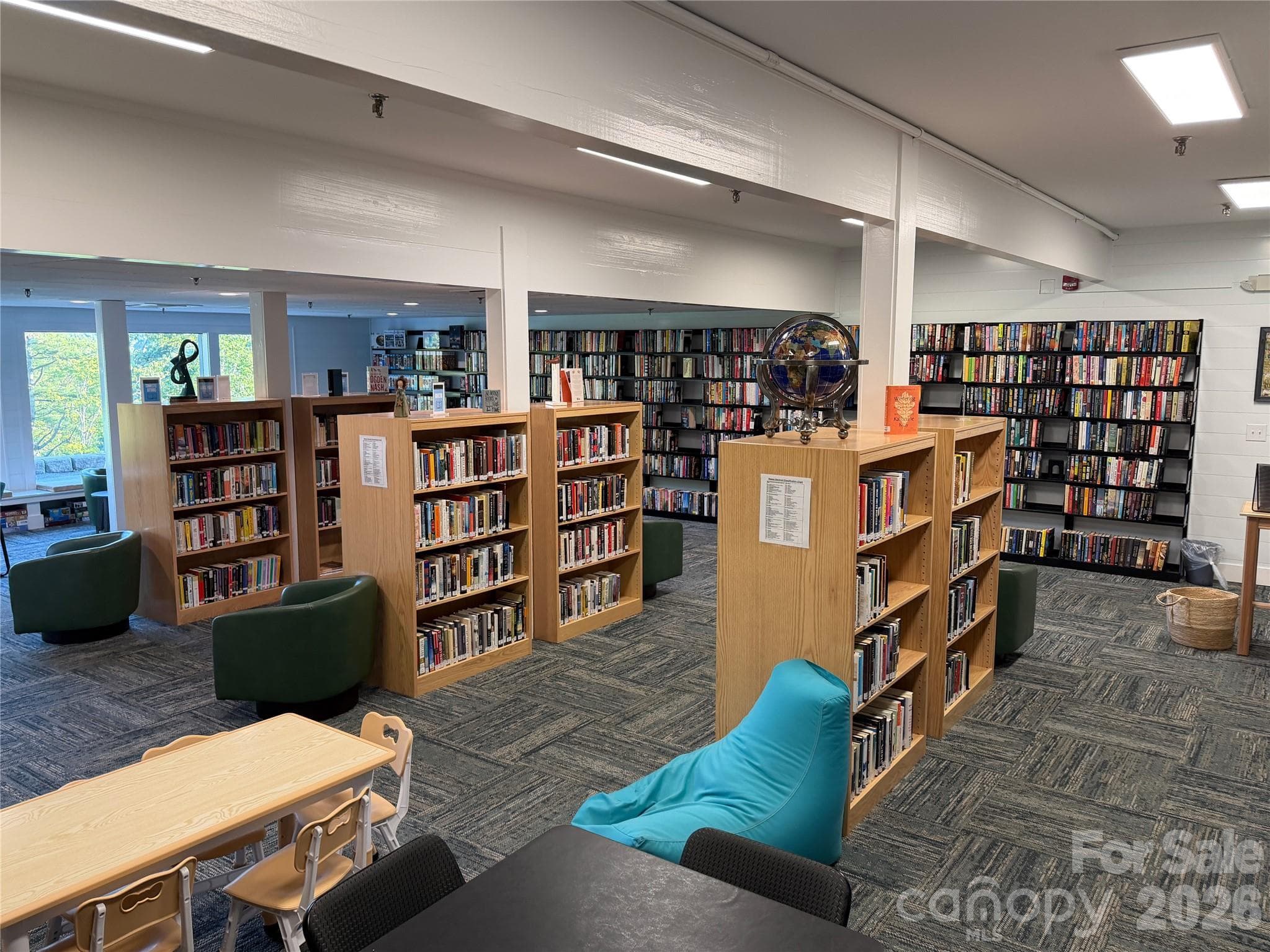 The new Library space within the Connestee Falls Clubhouse. - 111 Kanunu Court, Brevard