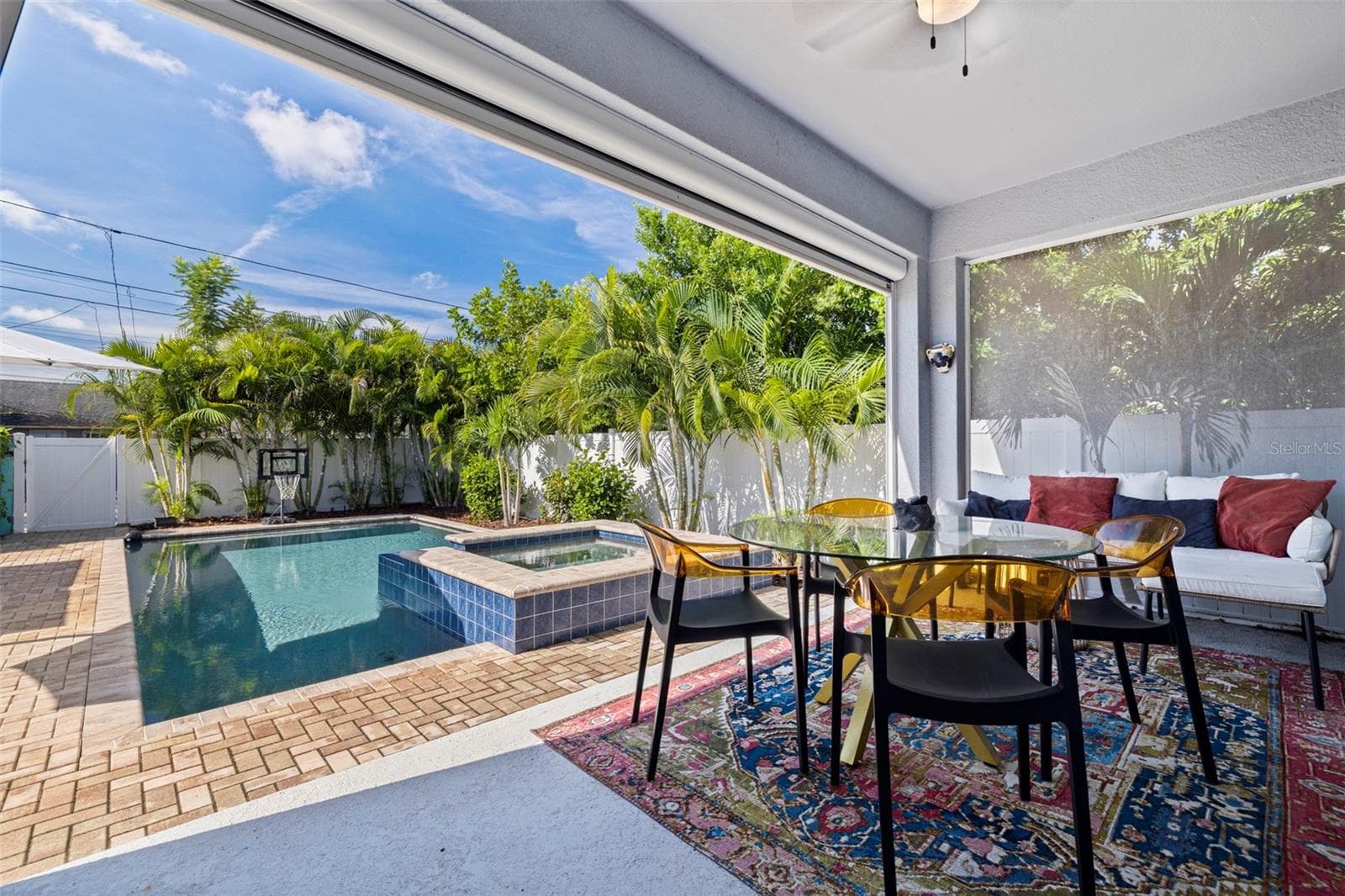 Rear Porch Screened in with Electric Shade When Needed. - 4626 10TH AVE N, ST PETERSBURG