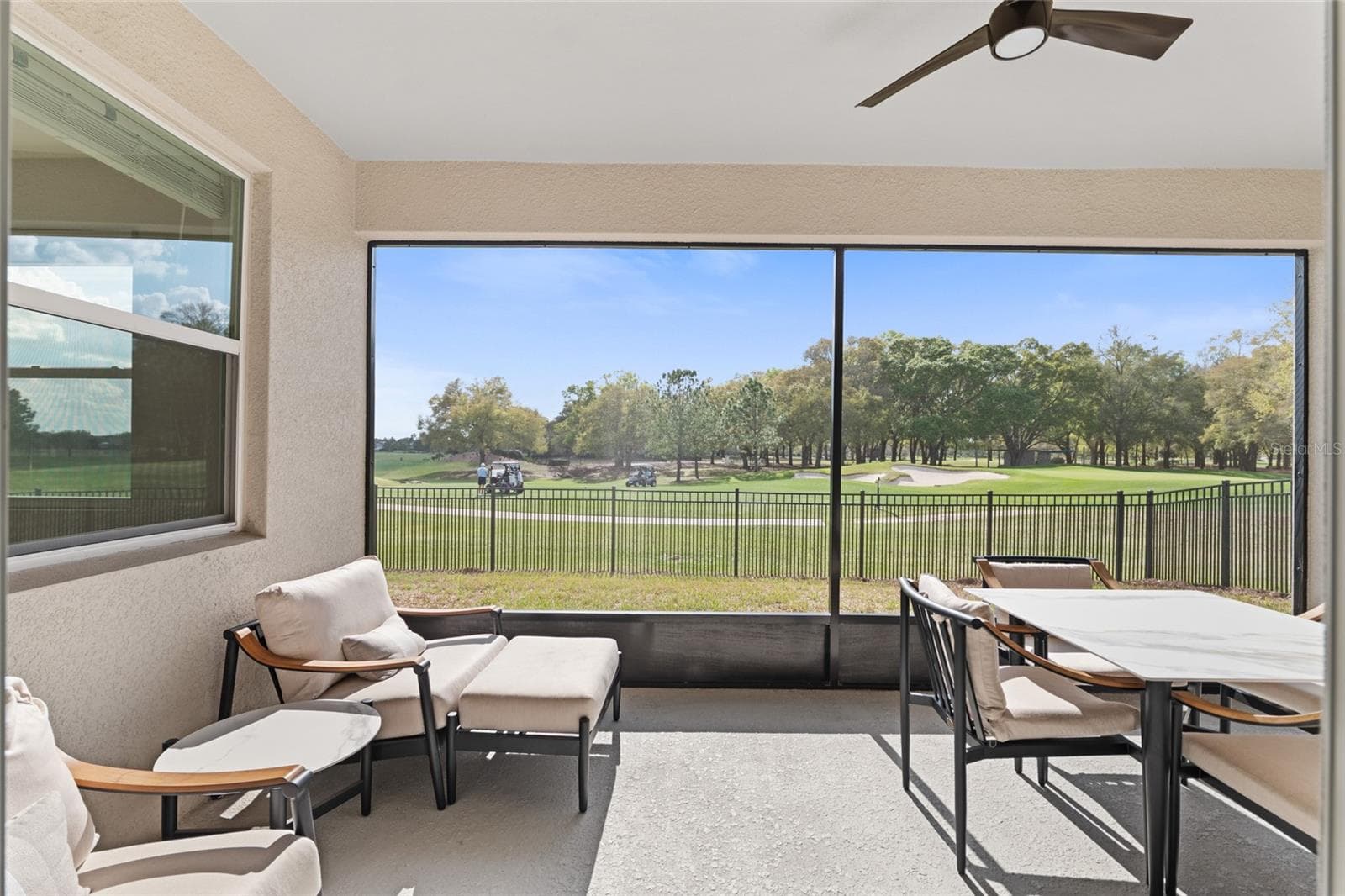 SCREENED IN LANAI - 4940 NW 39TH LOOP, OCALA