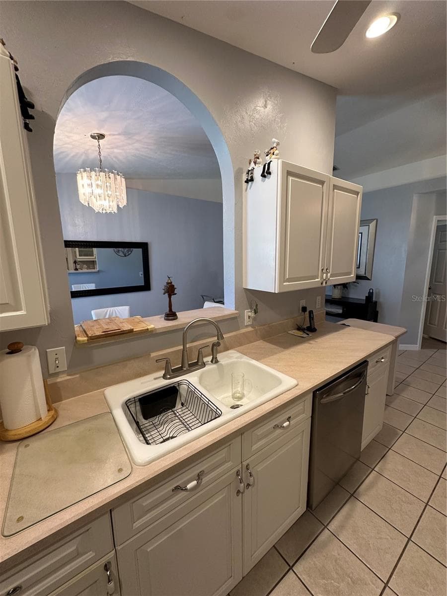 Kitchen w/pass through to dining room - 11793 CREEK DR, ALACHUA