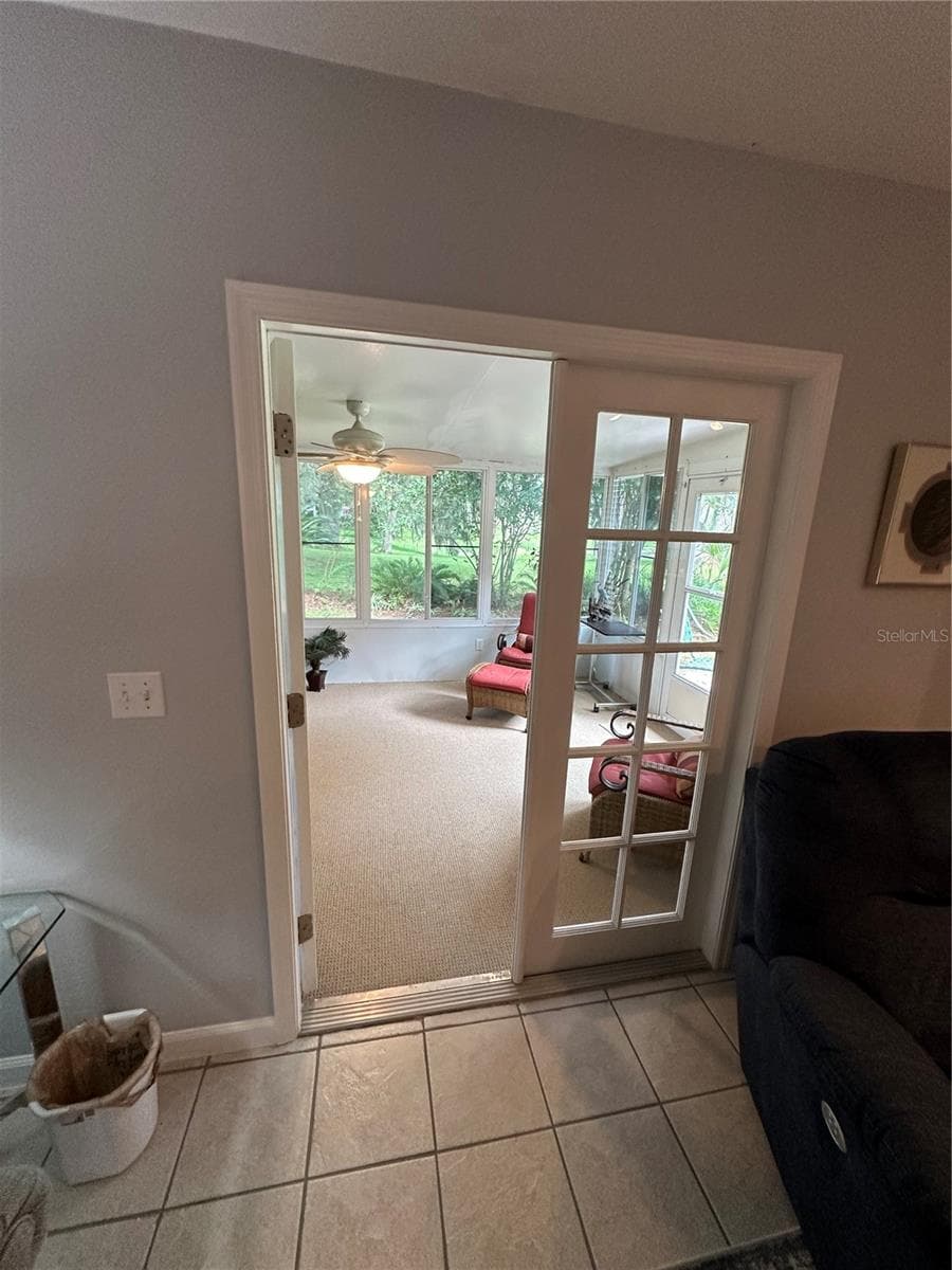 French doors to enclosed porch - 11793 CREEK DR, ALACHUA
