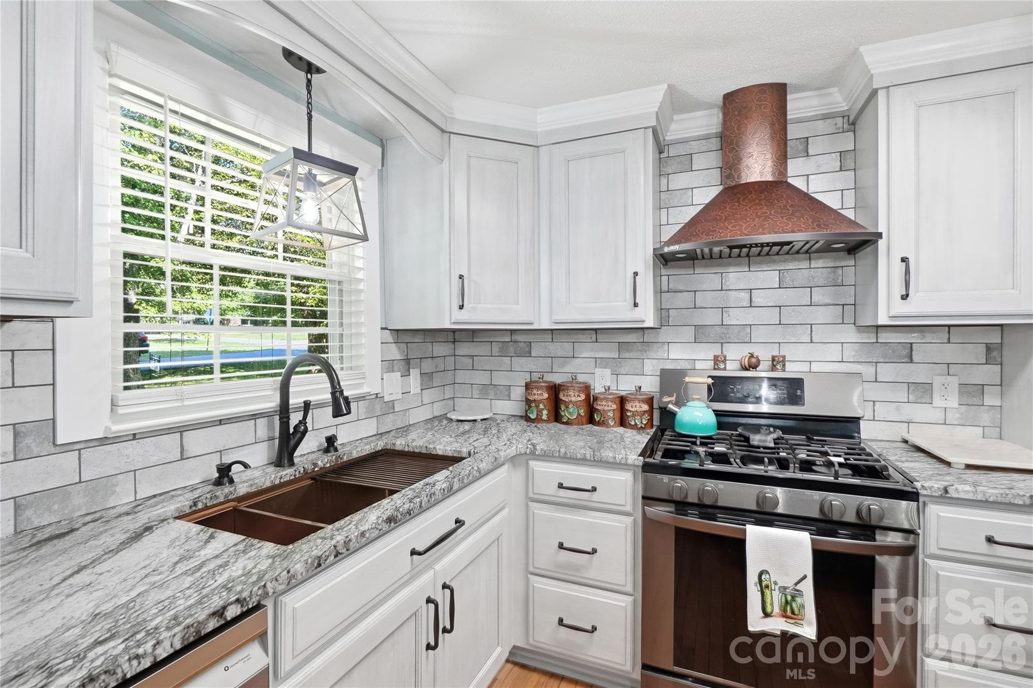 Oversized sink, gas range and copper hood - 1690 26th Street NE, Hickory