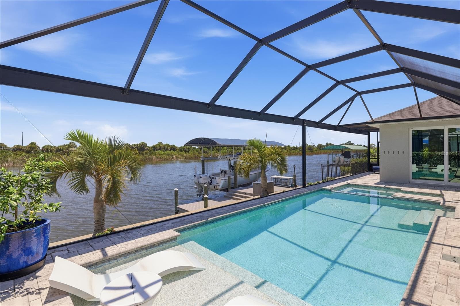 Heated Pool, with SunLedge, spa and large Lanai - 10628 MCALESTER CIR, PORT CHARLOTTE