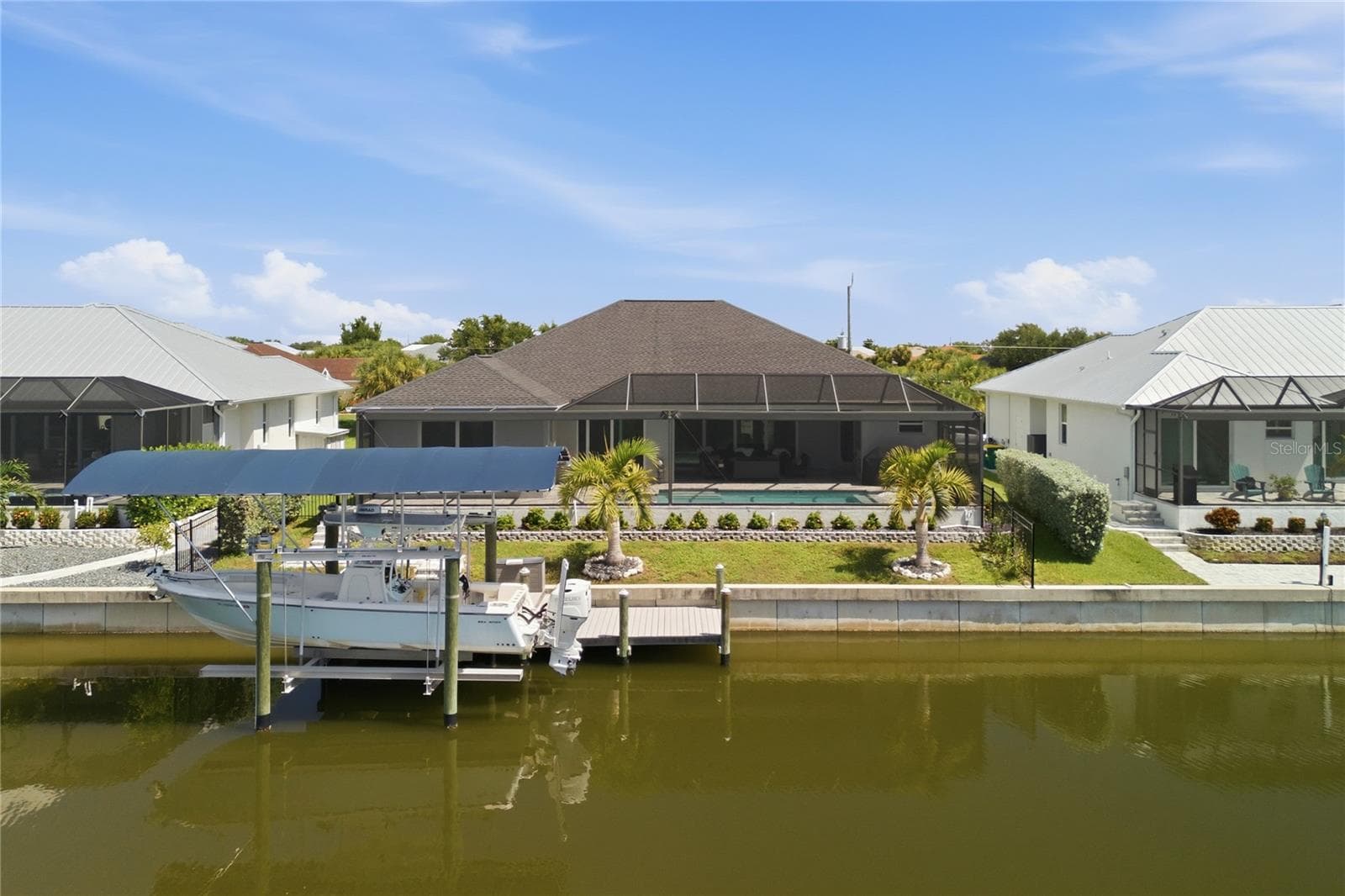 Concrete Seawall, with Lift and Dock - 10628 MCALESTER CIR, PORT CHARLOTTE