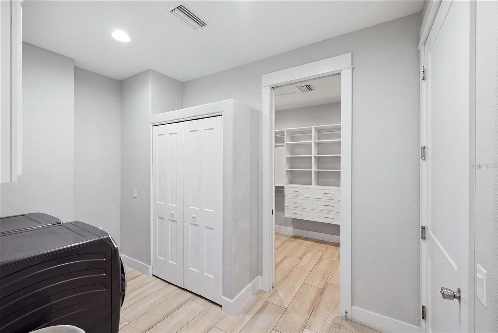 Laundry digitally decluttered- built in cabinets - 10628 MCALESTER CIR, PORT CHARLOTTE