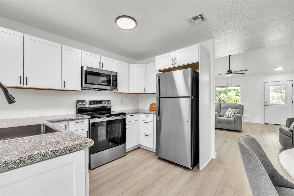 Single Family Residence at 537 CAPITOL ST, NORTH FORT MYERS, photo 7 of 35
