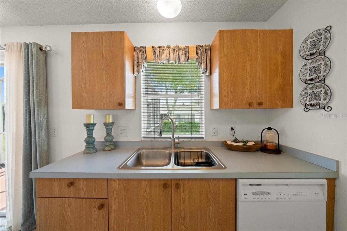 View of Your Backyard from Kitchen - 1410 SANCHEZ CT, THE VILLAGES
