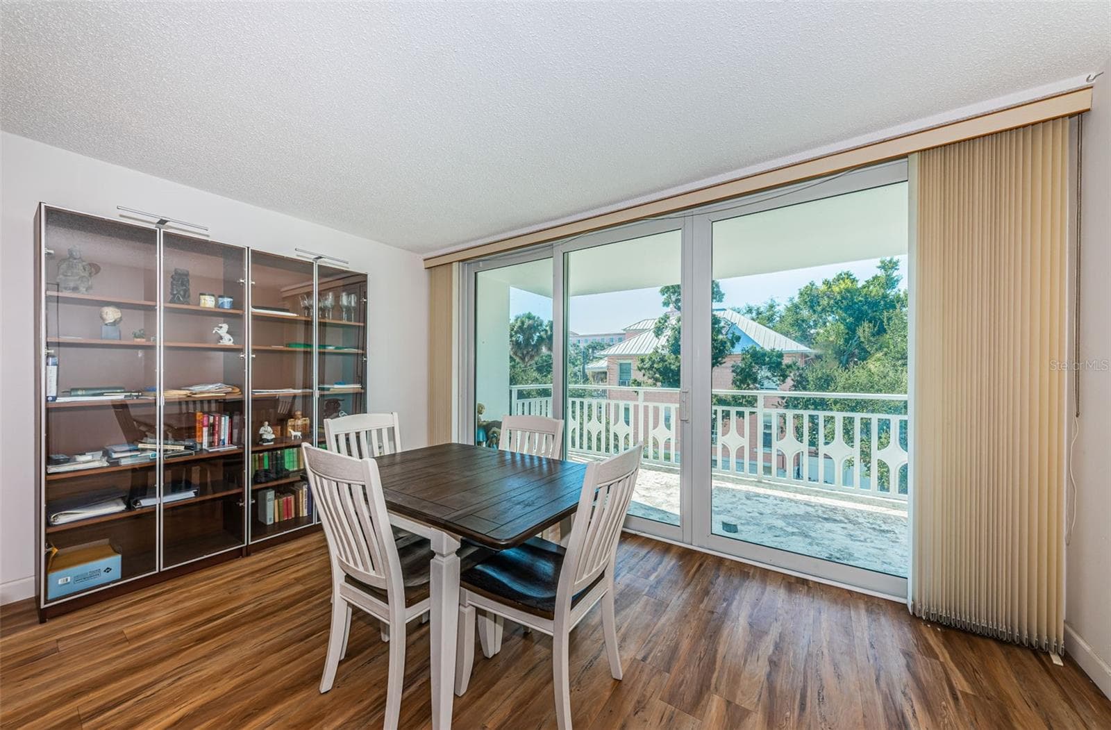 Dining area with Sliding Glass door to the balcony - 700 BEACH DR NE #308, ST PETERSBURG