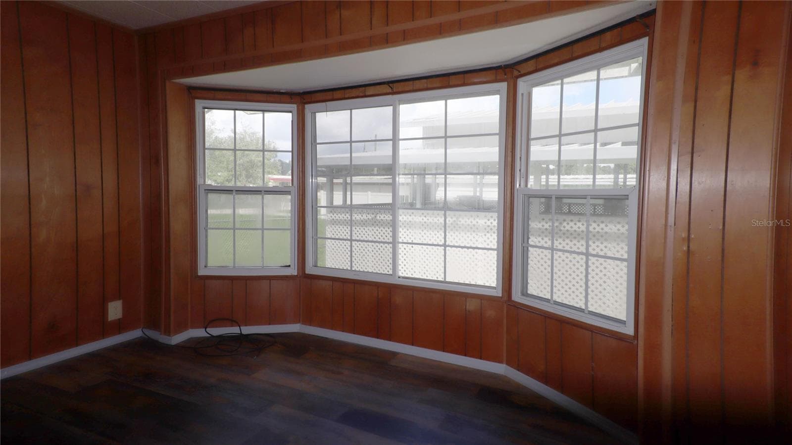 and a whole wall of bay windows... - 417 NE 64TH AVE, OCALA