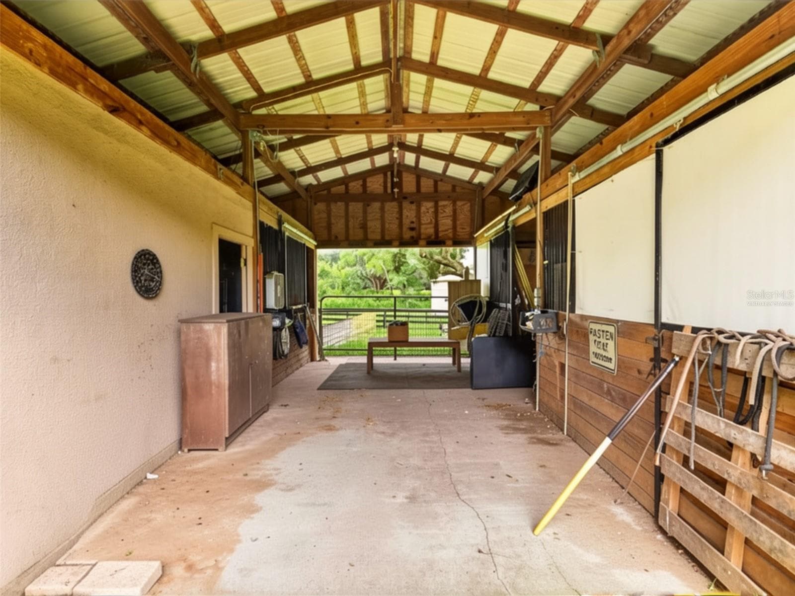 3 stall Barn w/tack room (virtually staged) - 8699 SE 12TH CT, OCALA