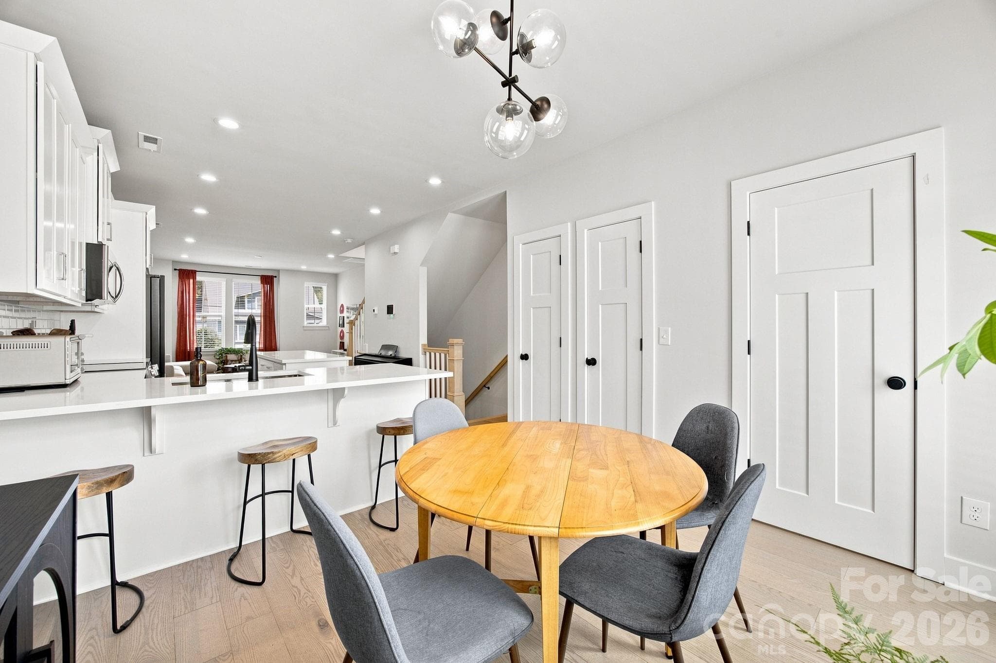 Dining area, pantry, coat cloest and half bath on main level - 2303 Rozzelles Ferry Road, Charlotte