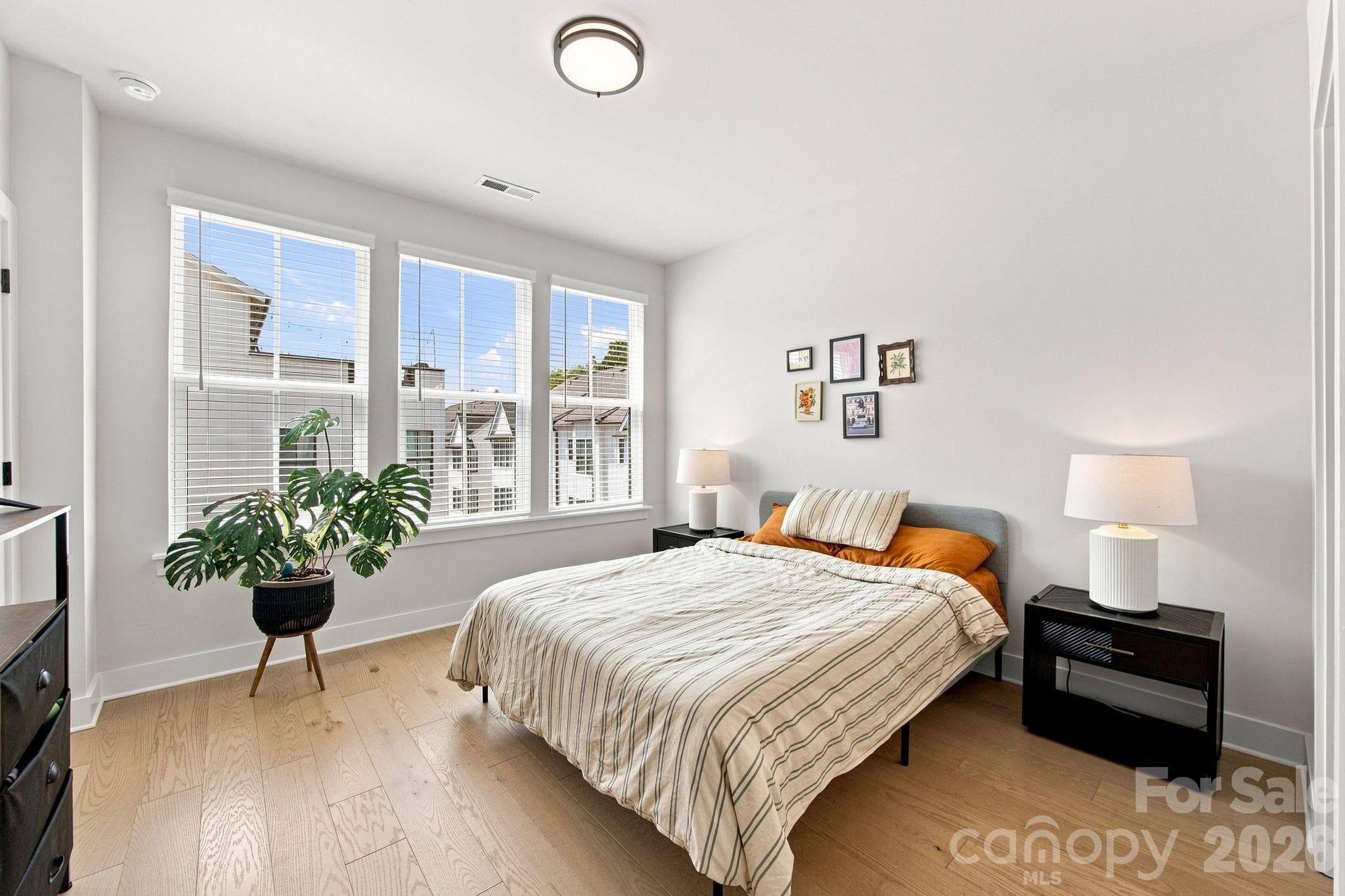 Light-filled primary bedroom - 2303 Rozzelles Ferry Road, Charlotte