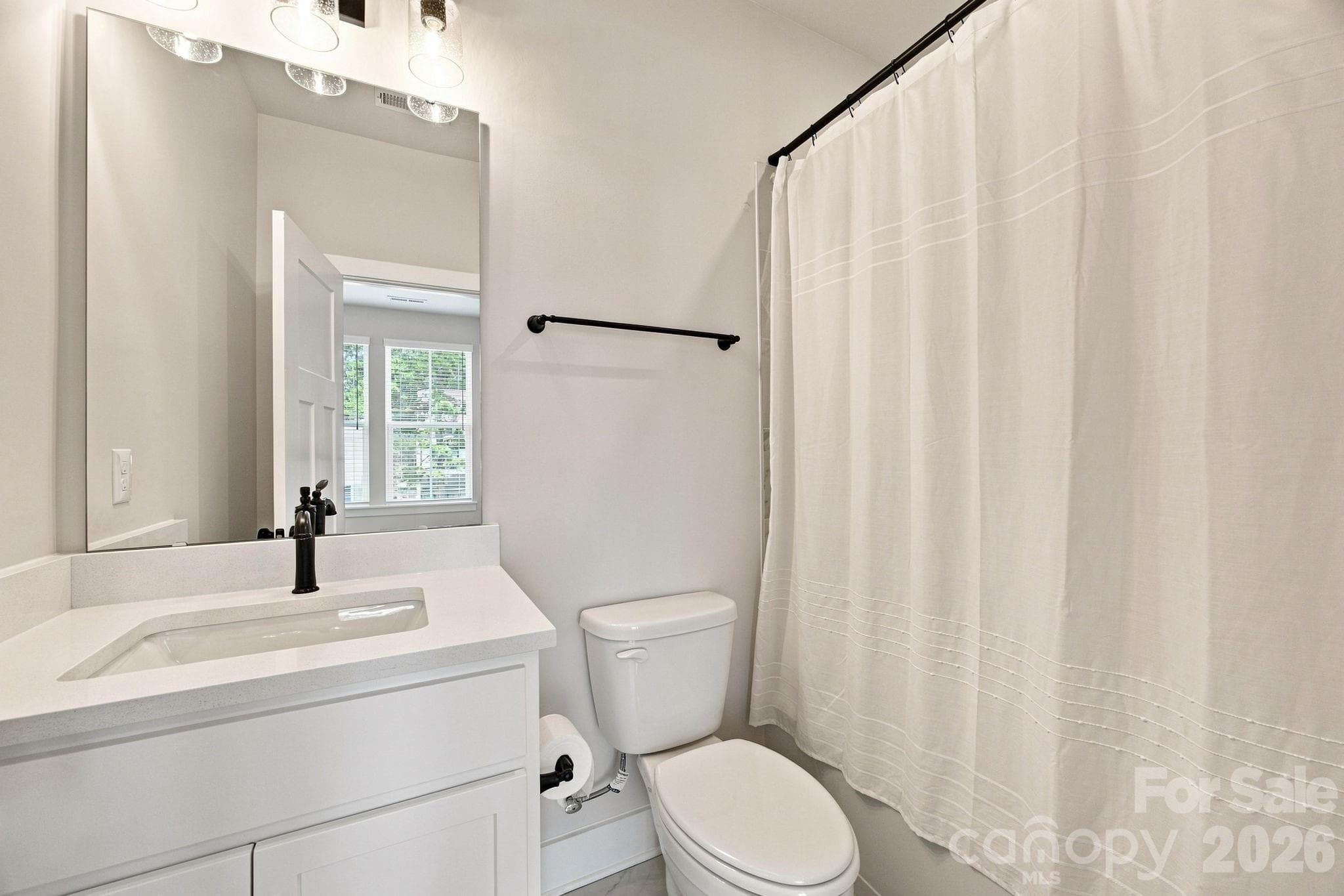 Ensuite bath for secondary bedroom - 2303 Rozzelles Ferry Road, Charlotte