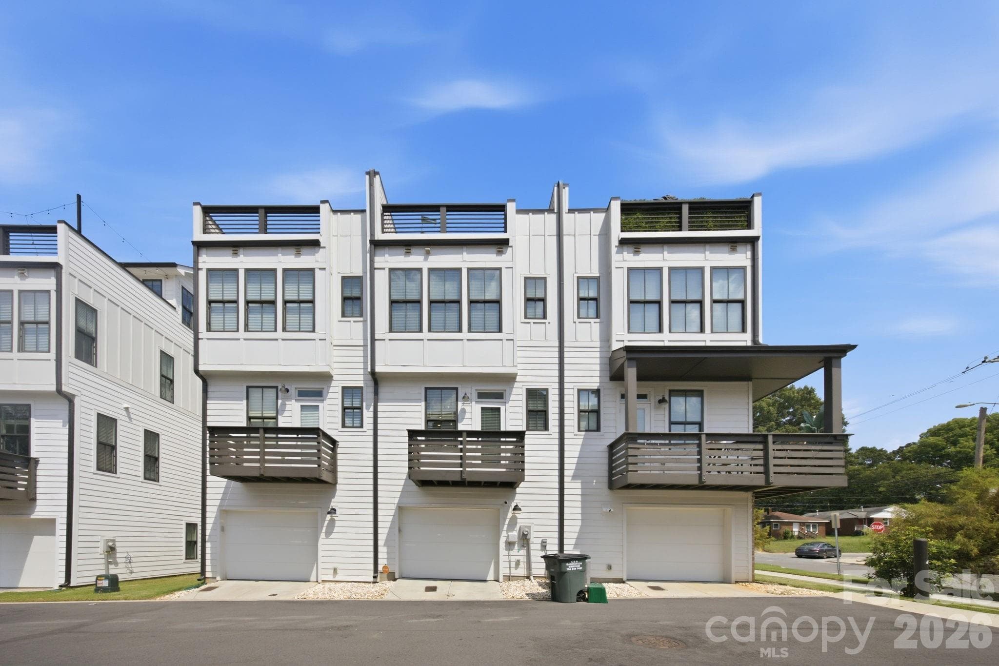 Rear access to garage from private road managed by HOA - 2303 Rozzelles Ferry Road, Charlotte
